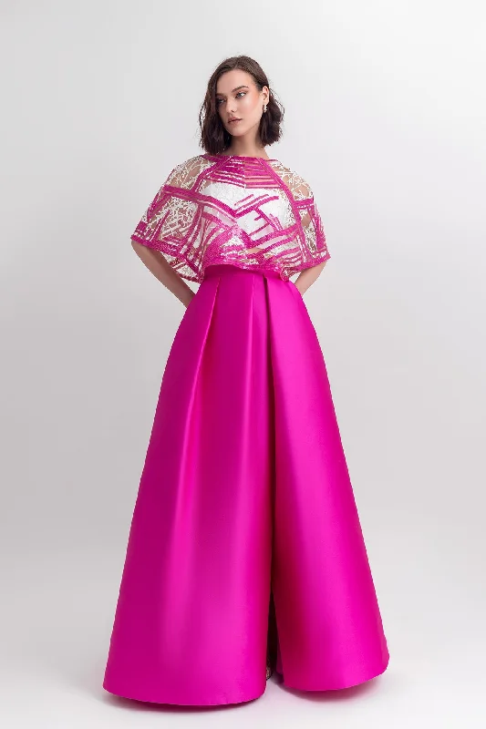 Cape-like sequins top, paired with a wide satin skirt with a slit on the side leather skirt bold